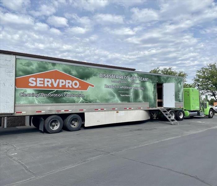 Servpro storm wrapped semi trailer being prepared to go on large losses