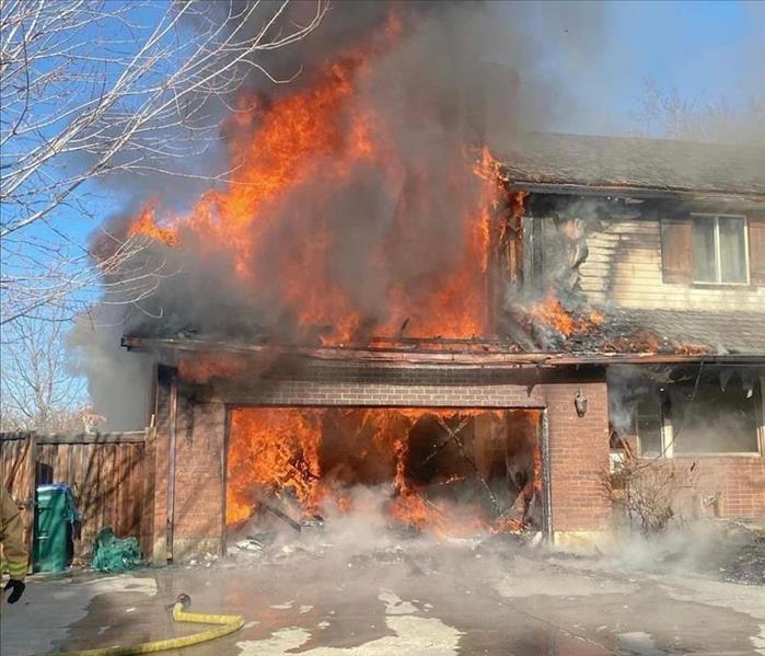 Garage ingulfed in flames in a home 